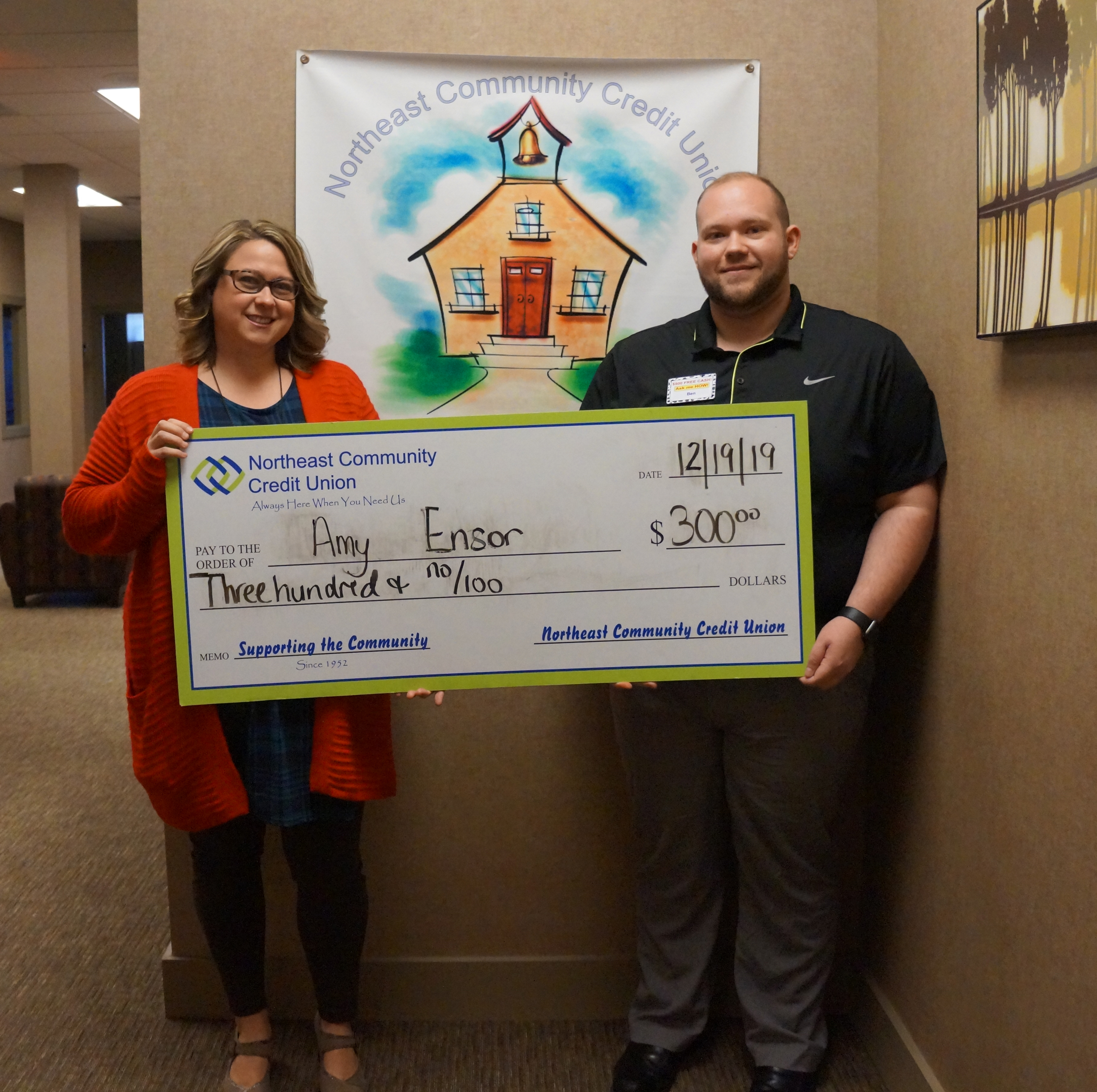Ben Smith presents the Helping Teachers Teach to Amy Ensor. 